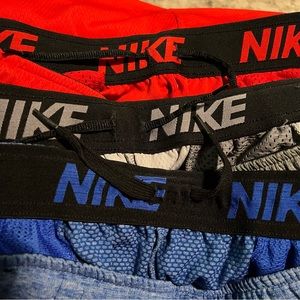 Bundle/lot of 3 Nike Dri Fit shorts. 3 pairs - gray, blue and red.  All size XL.